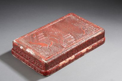 CHINE Rectangular box covered in the manner of red cinnabar lacquer with landscape...