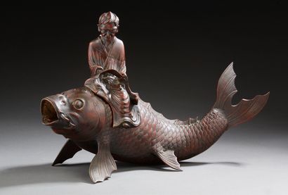 JAPON Okimono in bronze with reddish-brown patina representing a scholar sitting...