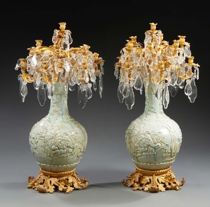 null A PAIR OF IMPORTANT VASES in "celadon" porcelain decorated in relief with sages,...