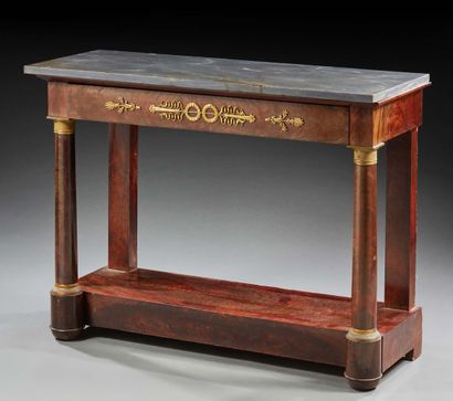 null A mahogany and mahogany veneer CONSOLE ; rectangular in shape, it opens with...