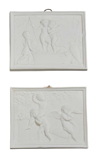 PAIR OF BISCUIT PLAQUES representing in bas-relief...