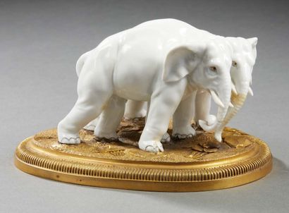 null CAPO DI MONTE Enamelled porcelain group representing a couple of elephants;...