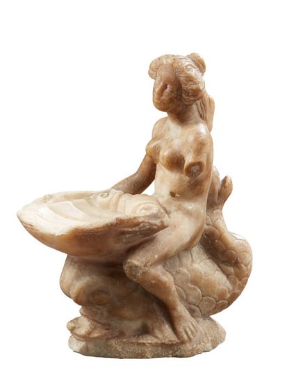 A sculpted alabaster GROUP in the round representing...
