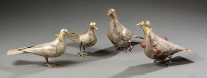 null SET of four finely chased silver turtledoves, some set with stones.
Oriental...