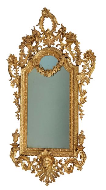 null RARE PAIR OF MIRRORS with mercury in their richly carved and gilded frames;...