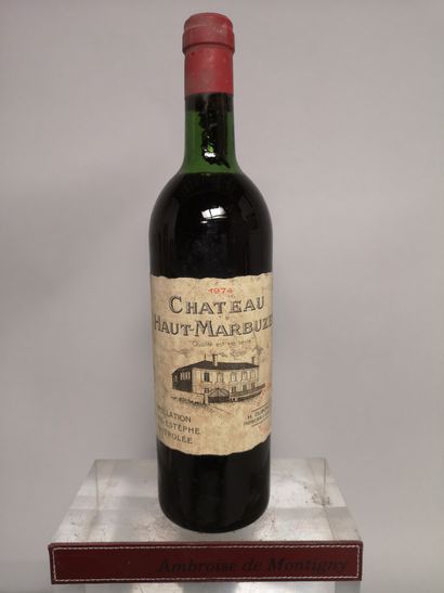 null 1 bouteille Château HAUT MARBUZET - Saint Estèphe 1974 

Étiquette tachée, ...