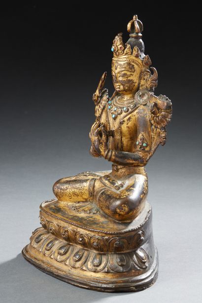 ART SINO-TIBETAIN Exceptional figurine in gilded copper alloy with brown patina representing...