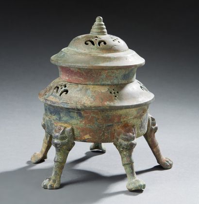 CHINE Perfume burner in bronze with a brown and green patina of excavation resting...