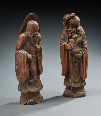 CHINE Two wooden statuettes of deities. 19th century H. 21 cm (accidents and missing...