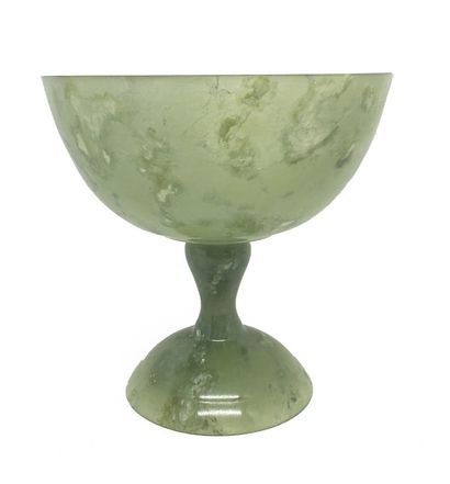 CHINE Green stone bowl on a pedestal in imitation of jade. Modern period. Height...