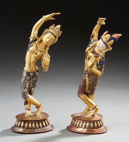 ASIE DU SUD-EST (CAMBODGE ?) Pair of gilt bronze, silvered and polychrome and gold...
