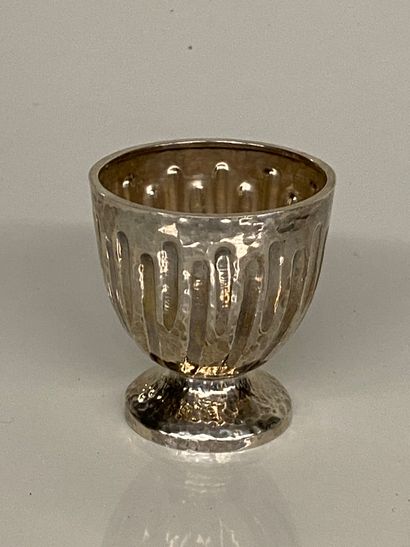 ZOLOTAS A small silver bowl on a pedestal with fluted decoration on a hammered base.
Weight...