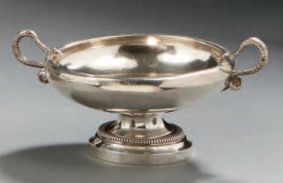 null A silver WEDDING CUP. It rests on a circular pedestal moulded with a frieze...