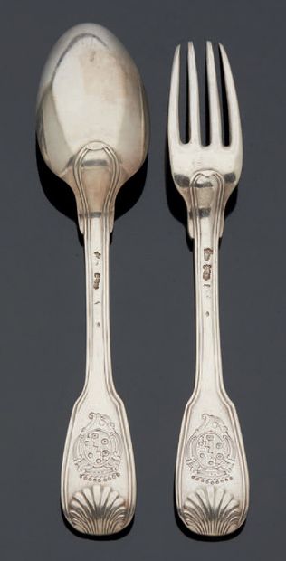 null A silver tableware, filets and double shell model, spatulas engraved with a...