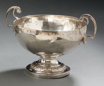null Silver WEDDING CUP. It stands on a circular pedestal moulded with a frieze of...