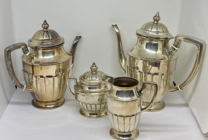 null A silver TEA AND COFFEE SET consisting of a teapot, a coffee pot, a sugar bowl...