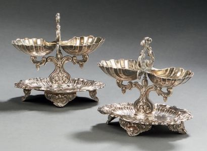 null PAIR OF DOUBLE SALONS in silver with decorations of shells Saint
Jacques.
Minerve...