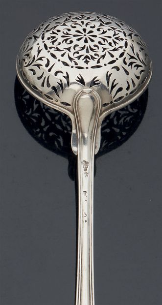 null A silver SAUPOUDRER SPOON, threaded model. Beautiful repercé with central rose....