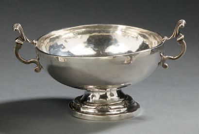 null Silver WEDDING CUP. It stands on a circular pedestal moulded with a frieze of...