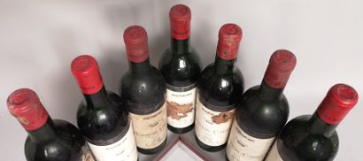 null 7 bottles MOUTON CADET Baron Philippe de Rothschild 1964 Stained labels. 1 high...