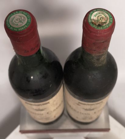 null 2 bottles MOUTON CADET Baron Philippe de Rothschild 1966 Slightly stained labels....