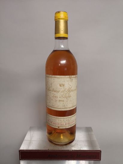 null 1 bouteille Château YQUEM - 1er GCC Sauternes 1986 Étiquette légèrement tachée....