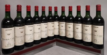 null 12 bottles MOUTON CADET Baron Philippe de Rothschild 1964 Slightly stained labels....