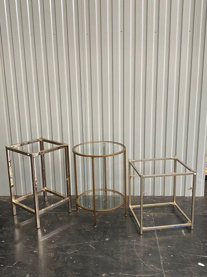 null Set consisting of a coffee table and three sofa ends with metal frames and glass...