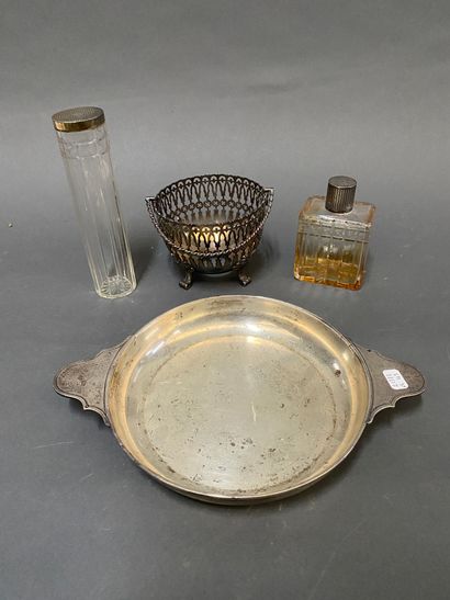 null 
Bowl with ears and silver setting 




Joint 




Two bottles of toilet with...