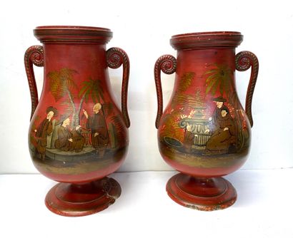 null ENGLAND 

Pair of ceramic vases with Far Eastern lacquered decoration on a red...