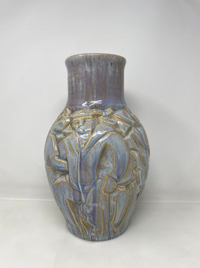 null EDOUARD CAZAUX (1889-1974)

Vase en faience vernissée à décor en relief de personnages...