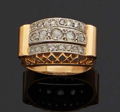 null Large 750 mm yellow gold and platinum ring, the curved basket-cage top set with...