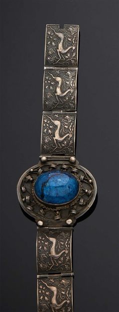 null 
BRACELET articulated silver 800 mm, decorated in its center with a blue stone...