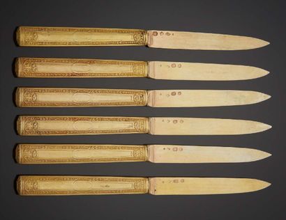 null Nice set of six silver gilt knives, the handle decorated with reserves and medallions....