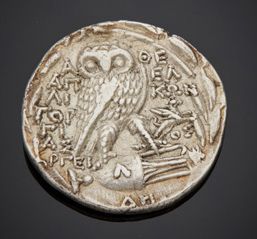 null Silver tetradrachm, head of Athena on the right, wearing the Athenian helmet...