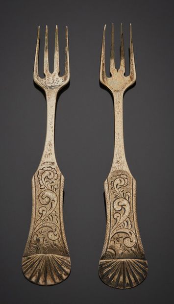 null Set of two silver olive or pickle forks, the spatulas chiseled and topped with...