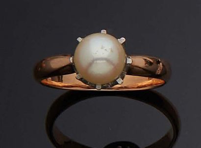 null RING in pink gold 750 mm and platinum decorated with a cultured pearl mounted...