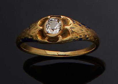 null Yellow gold ring 750 mm with a small old cut diamond mounted in solitaire, traces...