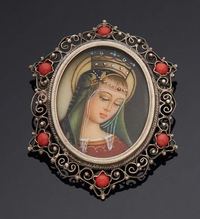 null Silver PENDANT pin set with coral cabochons representing the virgin.
Gross weight:...