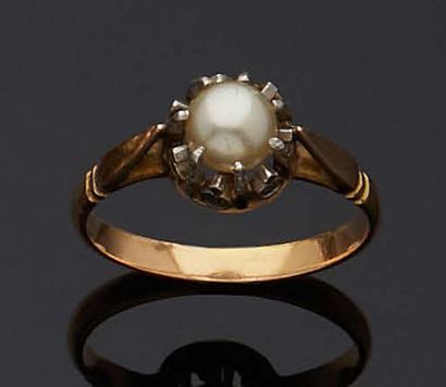 null RING in pink gold 750 mm and platinum decorated with an imitation pearl on descended...