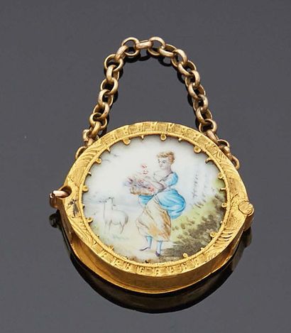 null Small metal MEDAL decorated on one side with an enamel depicting a shepherdess...