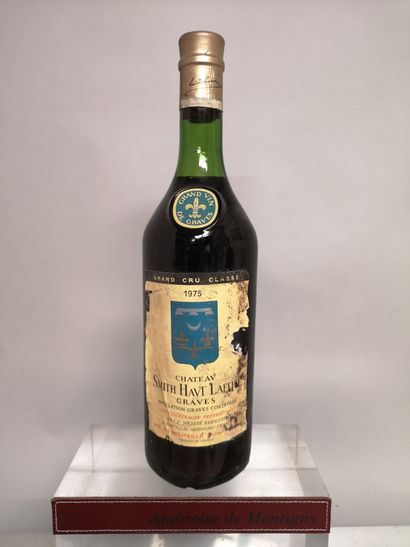 null 1 bouteille Château SMITH HAUT LAFITTE - Gc de Graves 1975 Etiquette tachée...