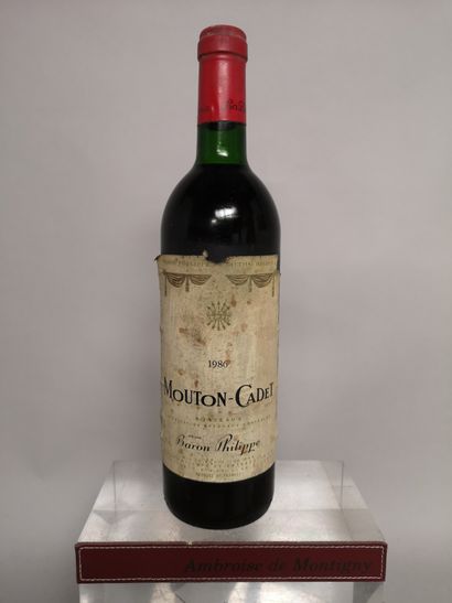 null 1 bouteille MOUTON CADET - Bordeaux 1986

 Etiquette tachée et abîmée. Légèrement...