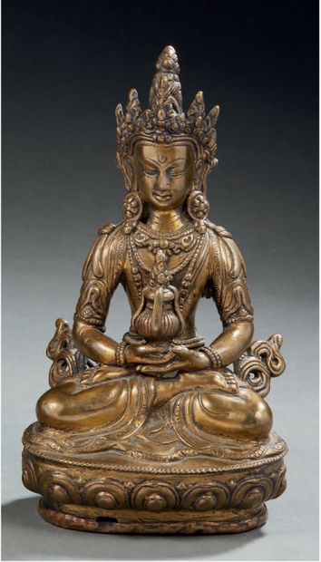 null NEPAL

Brass figurine representing Amitayus seated in dhyanasana on a lotiform...