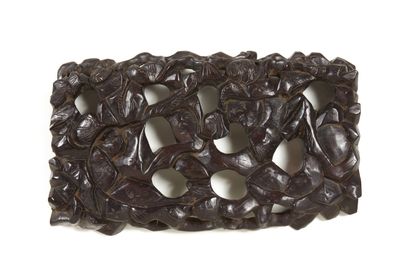 null CHINA

Wood carved openwork representing rocks framed by branches of prunus...