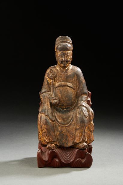 null CHINE

Figurine en bois sculpté en partie doré représentant un dignitaire assis...