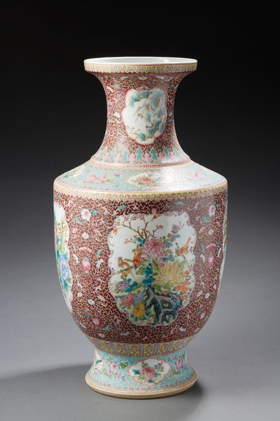 null CHINA

Large porcelain vase of baluster form decorated in famille rose enamels,...