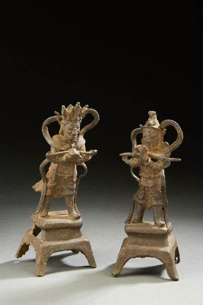 null CHINA

Pair of cast iron or bronze figures with traces of gilding, representing...