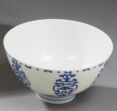 null CHINA 

Circular porcelain bowl decorated in blue underglaze with scrolls and...