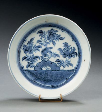 VIETNAM Circular porcelain cup decorated in blue underglaze with lotus flowers, a...